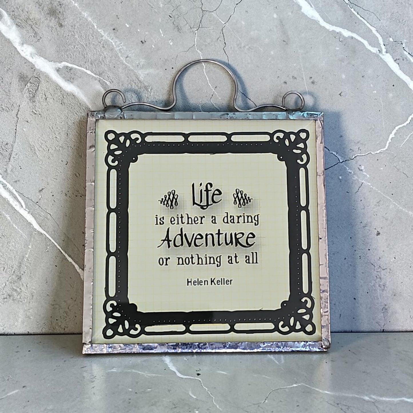 Beveled Expressions: Life Is Either A Daring Adventure Or Nothing At All